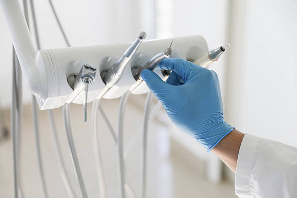 Professional Tooth Extraction technician working in Papillion, NE